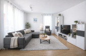 Wohnzimmer Einrichtungsbeispiel - 2-Zimmer-Wohnung mit 14 m² Balkon und TG-Stellplatz in Trudering