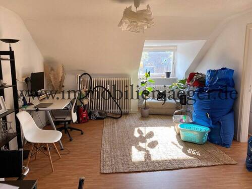 Wohnzimmer 1 - 2 Zimmer Etagenwohnung zur Miete in Norderstedt