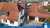 Hausansicht - Heimstädten-Siedlung - Einfamilienhaus mit Doppelgarage, Kamin und Nebengelass in Halle (Saale)