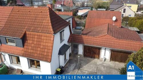 Hausansicht - Heimstädten-Siedlung - Einfamilienhaus mit Doppelgarage, Kamin und Nebengelass in Halle (Saale)
