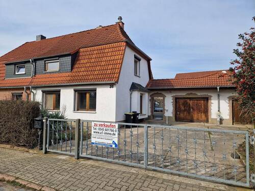 Hausansicht - 5 Zimmer Doppelhaushälfte zum Kaufen in Halle (Saale)