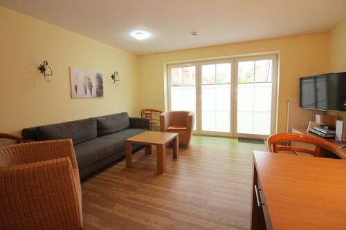 Wohnraum - Zugang Terrasse - 3 Zimmer Reihenmittelhaus in Butjadingen