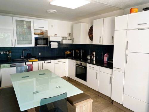 Küche mit Einbauküche - Etagenwohnung mit 77,30 m² in Ravensburg zum Kaufen