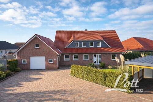 Bild 1 - +++ Großzügiges Einfamilienhaus mit Garage und Carport in ruhiger Sackgassenlage von Barßel! +++