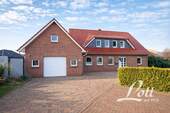 Bild 2 - 8 Zimmer Einfamilienhaus zum Kaufen in Barßel