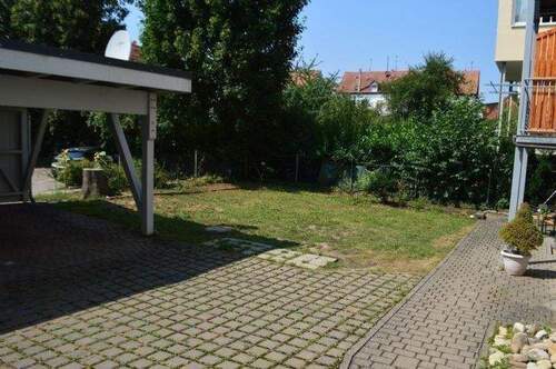 Carport mit Gemeinschaftsfläche Gartenbereich - 