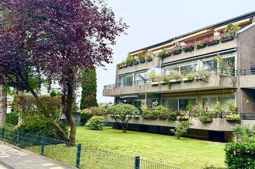 Hausansicht - Neuss-Rosellen: 2-Zi-Wohnung mit Wohlfühlfaktor - Kamin, großer Balkon & Garage!