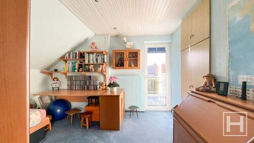 Zweites Zimmer mit Zugang zum Balkon - Einfamilienhaus mit 110,00 m&sup2; in Hüttblek zum Kaufen