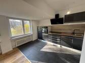 Bild 1 - Erstbezug nach Komplettsanierung - helle 2-Zimmer-Wohnung (56 m²) mit neuem Parkett & Einbauküche