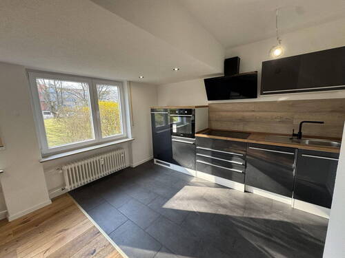 Bild 1 - Erstbezug nach Komplettsanierung - helle 2-Zimmer-Wohnung (56 m²) mit neuem Parkett & Einbauküche