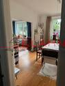 Blick ins Wohnzimmer - Einfamilienhaus mit 140,00 m² in Wedel zum Kaufen