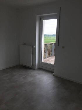 Wohnküche mit Blick auf den Ba - 