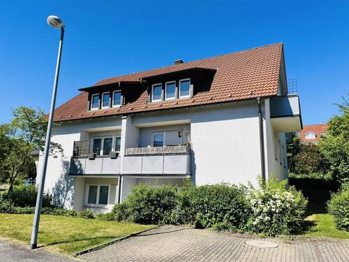 sonnig und ruhig gelegen... die Südansicht der Anlage - 2 Zimmer Etagenwohnung zum Kaufen in Haßfurt