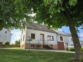 Vorderansicht 4 - 5 Zimmer Einfamilienhaus in Baustert