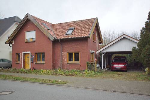 Vorderansicht mit Carport - Einfamilienhaus zum Kaufen in Steinfurt / Borghorst