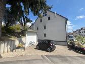 Garage mit Stellplatz - 
