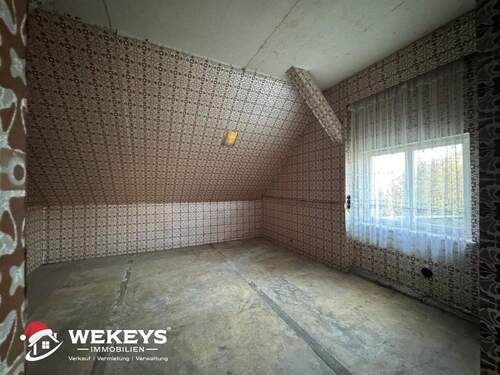 Nebengebäude_Zimmer im OG - 