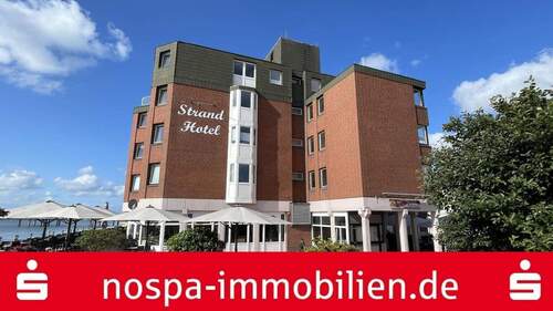 Titelbild - 2-Zimmer-Eigentumswohnung im 1. Obergeschoss mit Balkon zum Strand!