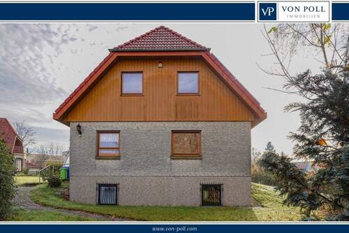 Titelbild - Ein charmantes Einfamilienhaus mit großem Garten und durchdachter Raumaufteilung