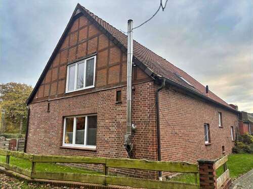 Seiten- und Rückansicht - 1 Zimmer Einfamilienhaus in Wustrow