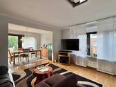 Wohnzimmer - Mehrfamilienhaus, Wohnhaus mit 96,50 m² in Brake zum Kaufen