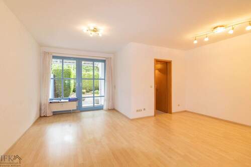 Wohnbereich - Wohnen wie im Haus! Maisonettewohnung mit eigenem Garten in Weilheim!