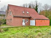 Hausansicht - Grün. Ruhig. Besonders. Einfamilienhaus direkt am Osternburger Utkiek