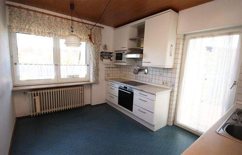 Küche mit Zugang zur Ostterrasse - 