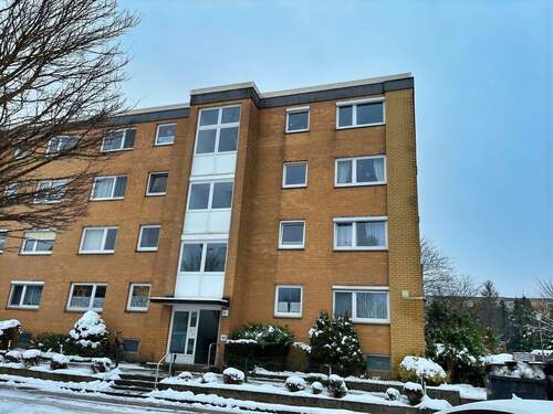 Straßenansicht - 3 Zimmer Etagenwohnung zum Kaufen in Tostedt