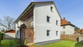 Außenansicht 3 - 8 Zimmer Einfamilienhaus zum Kaufen in Unterföhring