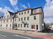 Objektansicht - Gepflegtes Mehrfamilienhaus mit 2 Gewerbeeinheiten und 2 großen Wohnungen - kurzfristig BEZUGSFREI