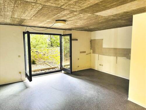 Nutzfläche 2 im Untergeschoss mit Gartenzugang - 