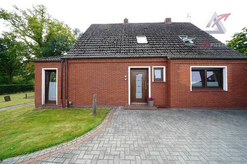 Eingangsbereich - Einfamilienhaus mit 150,00 m² in Uplengen zum Kaufen