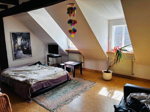 Schlafzimmer mit Gaubenfenster - 