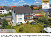 Rückansicht - Viel geboten: 3,5-Familienhaus mit großem Garten