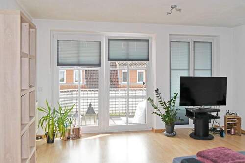 Wohnzimmer - Etagenwohnung mit 83,90 m² in Stade zum Kaufen