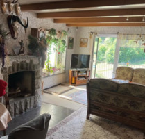 Großzügiges und freistehendes Einfamilienhaus mit Einliegerwohnung, Doppelgarage und Weitblick in ruhiger Waldrandlage in Schonungen, OT