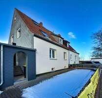 Großzügiges Wohnen in Hemmingen - Ein-Zweifamilienhaus