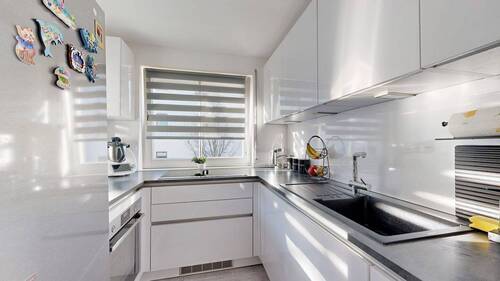 15 Küche mit Einbauküche - 