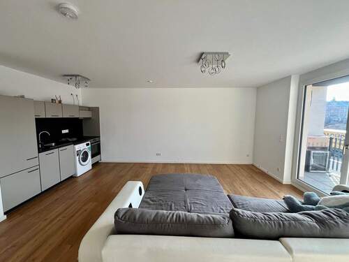 Wohnbereich mit EBK - 2 Zimmer Etagenwohnung zur Miete in Fürth