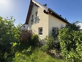 Außenansicht Garten - Einfamilienhaus mit 103,00 m&sup2; in Parthenstein OT Klinga zum Kaufen