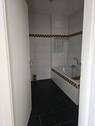 Badezimmer mit Badewanne - 
