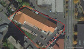 Luftbild - Gewerbegrundstück 5.945 m² bebaut Nutzfläche 1.941 m² vermietet an bekannten Lebensmittelhändler