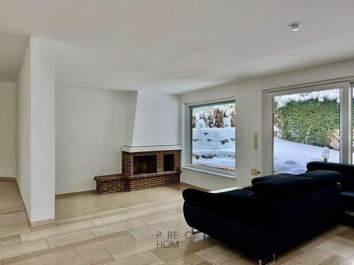 Wohnbereich - Ankommen. Wohlfühlen. Erdgeschosswohnung mit Terrasse, Kamin und Garage in Top Lage