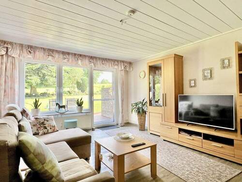 Wohnzimmer EG - 8 Zimmer Mehrfamilienhaus, Wohnhaus zum Kaufen in Auetal / Borstel