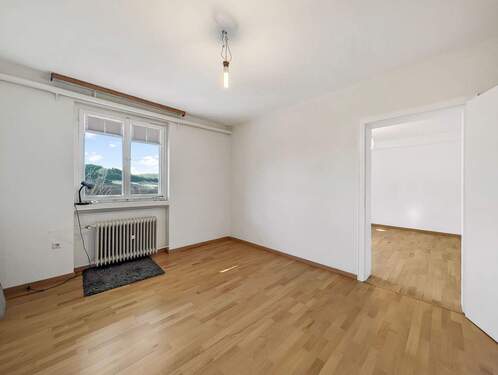 Einliegerwohnung Schlafzimmer - Werz Immobilien - 