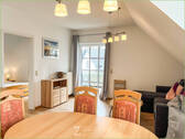 Wohn- und Essbereich mit Balkon - 2 Zimmer Etagenwohnung in Garding