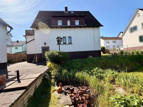 Gartenansicht mit Teich - 