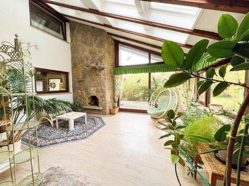 Wintergarten mit Zugang zum Garten - 