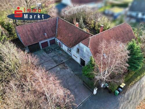 Ansicht Nord-West - 8 Zimmer Mehrfamilienhaus, Wohnhaus zum Kaufen in Espelkamp